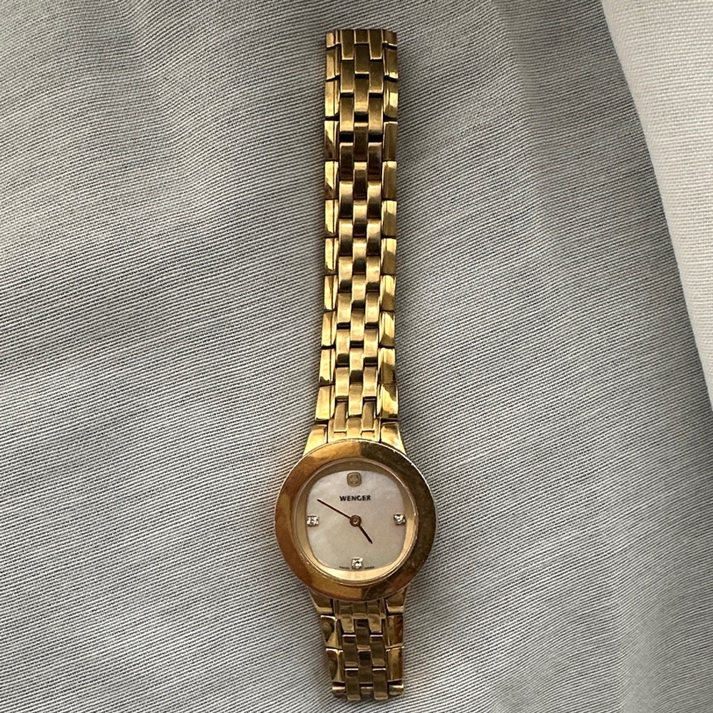 Wenger Gold Watch with sapphire crystal . Water resistant